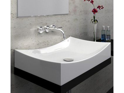 Keramické umyvadlo na desku Besteco Pandus 66x39x14 cm v lesklém bílém provedení.