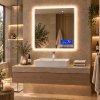 LED zrcadlo BESTECO Bright 70x65 cm s nastaveným teplým tónem osvětlení v moderní koupelně.