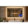 LED zrcadlo BESTECO Bright 100x65 cm s nastaveným teplým tónem osvětlení v moderní koupelně.