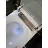 Pohled shora na otevřené bidetovací WC Besteco s LED podsvícením a ovládacím panelem