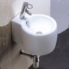 Závěsné keramické umývátko Besteco Tondo 35x30 cm v lesklém bílém provedení s otvorem pro baterii. kód TONDO35