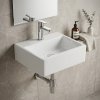 Keramické umývátko Besteco Cubo 43x30 cm v lesklém bílém provedení se středovým otvorem pro baterii.Kód: TR4128